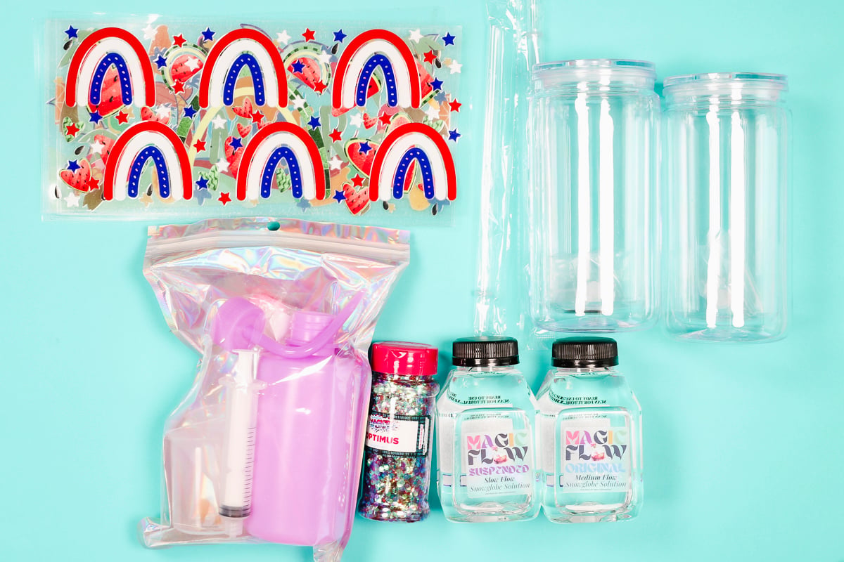 Supplies used for glitter snow globe tumblers.