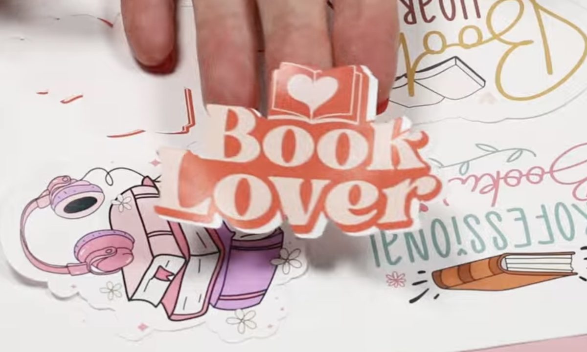 Detailed book lover sticker without offset with cut line off center.