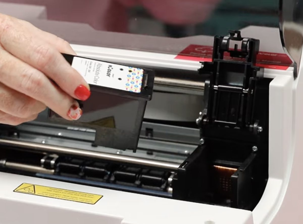 Load ink cartridge into the iColor 250.
