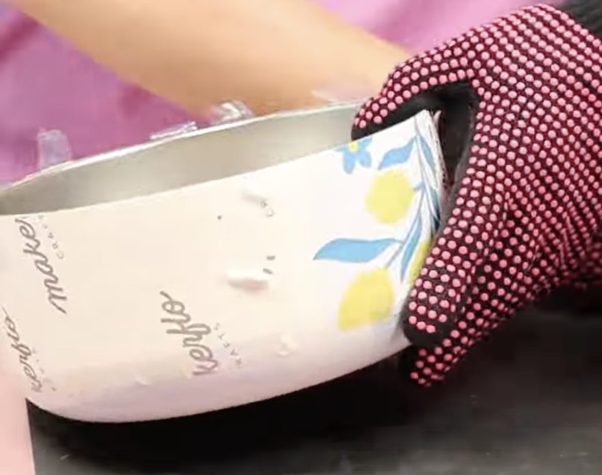 Peel away the shrink sleeve while it's still hot.