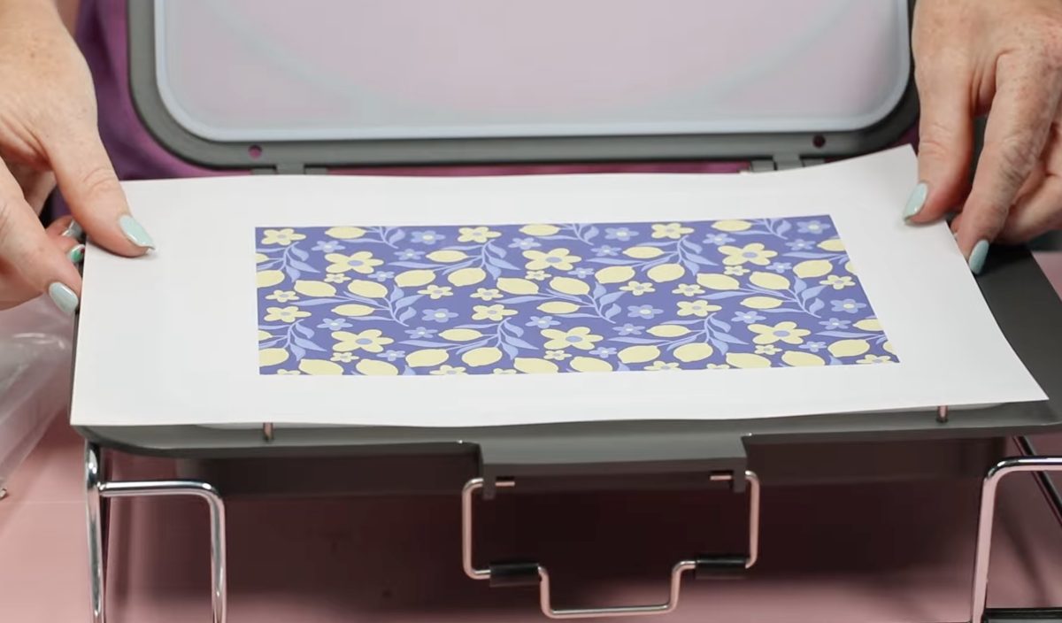Trim the print so it will fit in the vacuum tray.