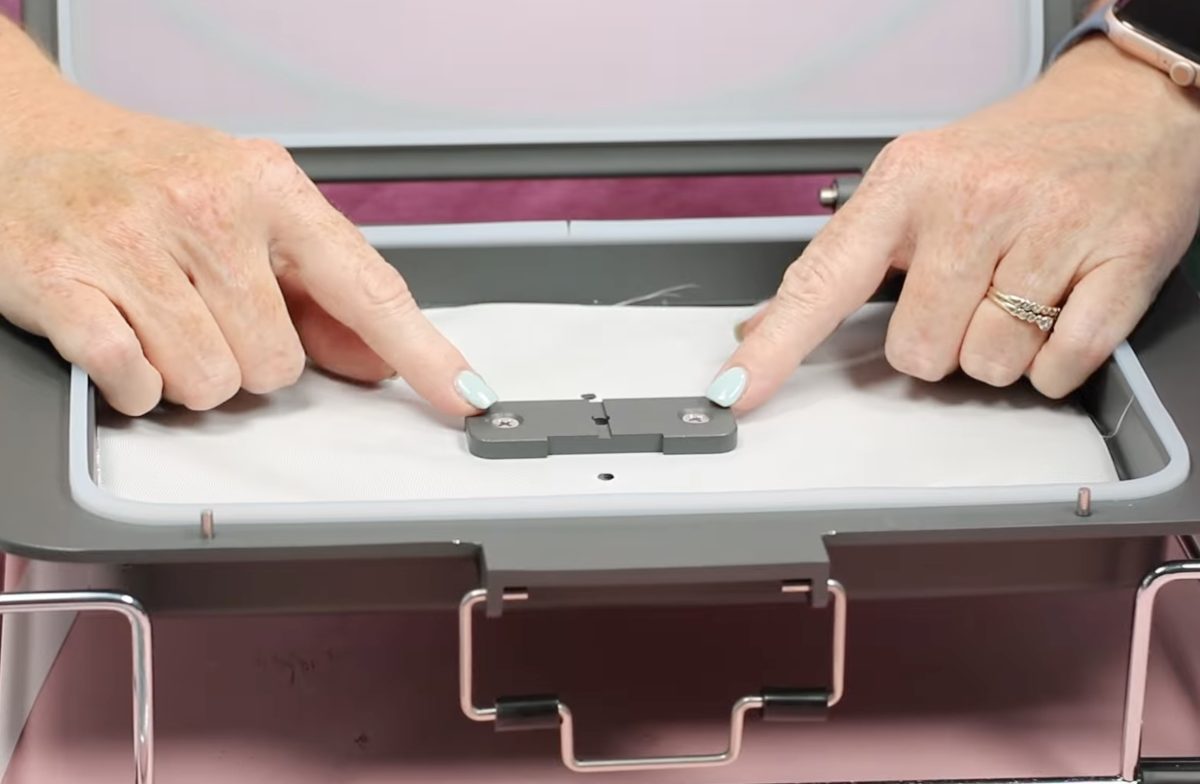 Add jig holder to the bottom of the tray.