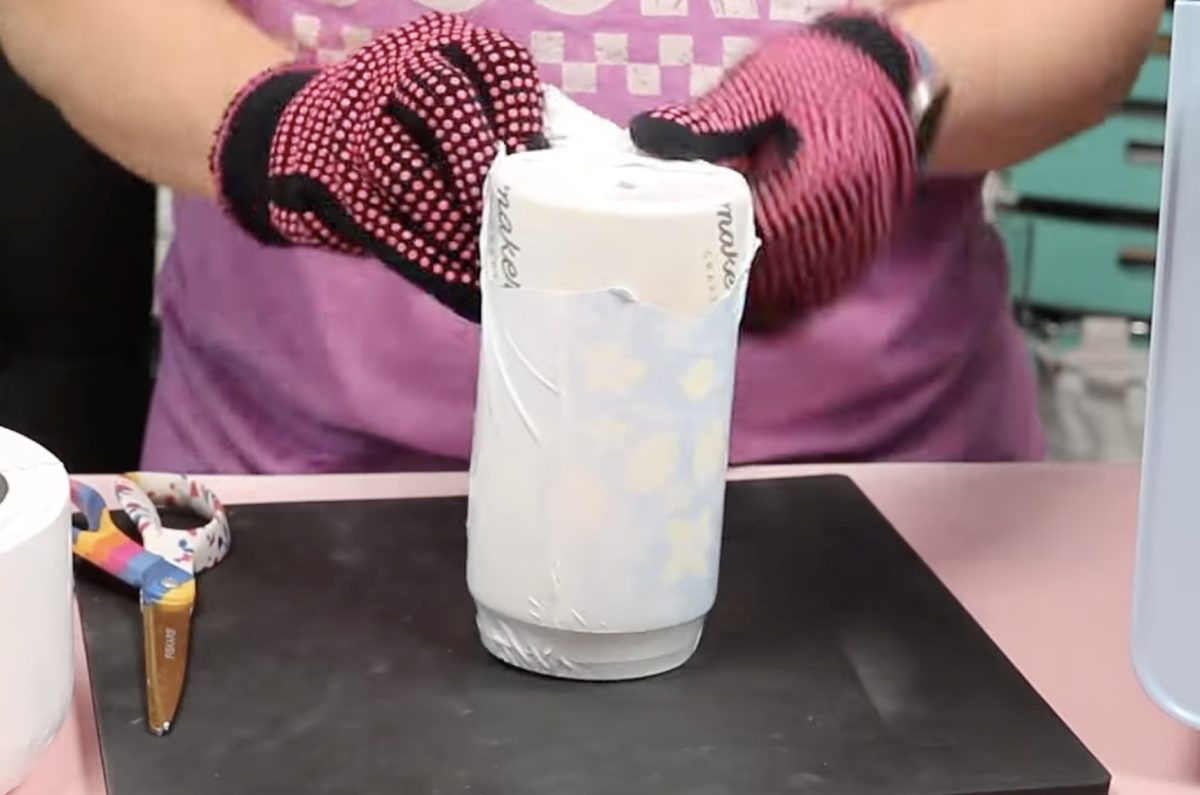 Remove the shrink sleeve while it is hot.