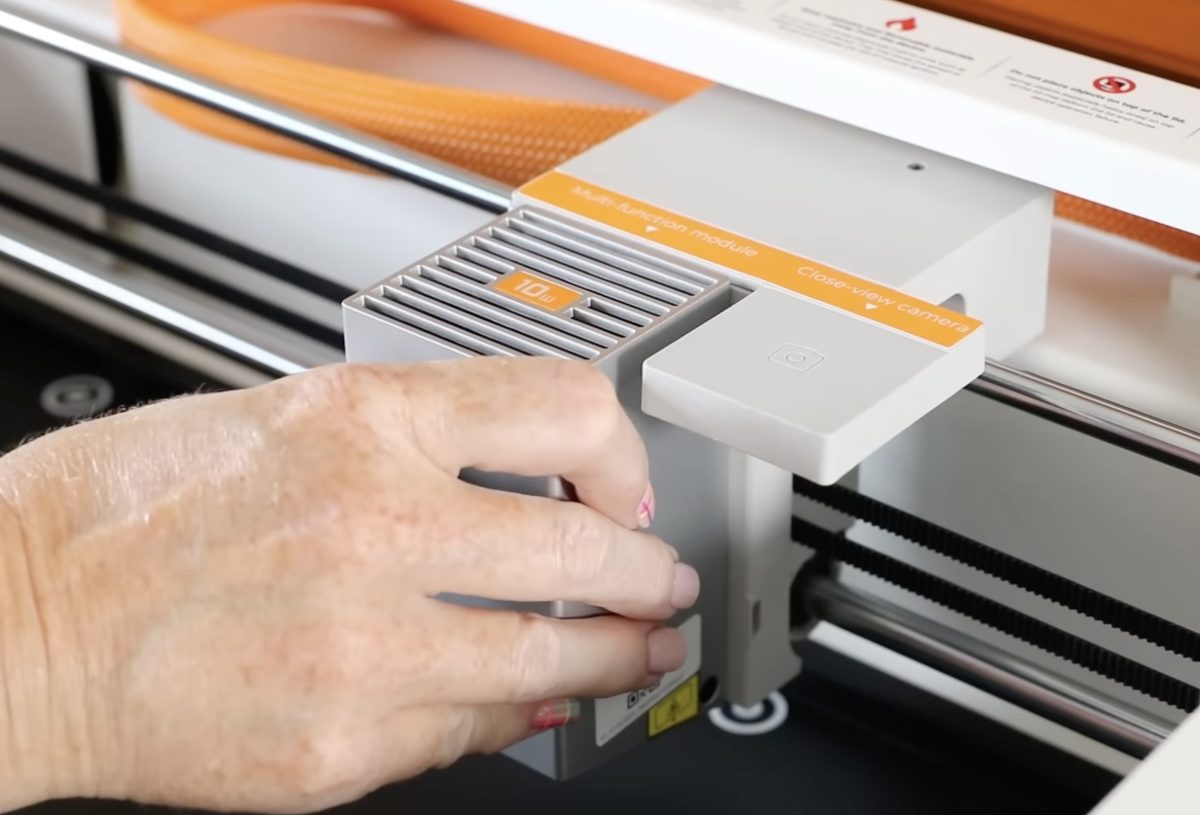 Attach laser module.
