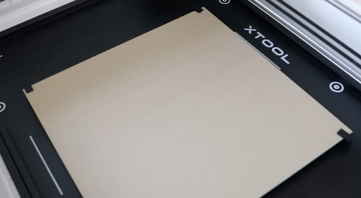Magnetic clips hold the material in place.