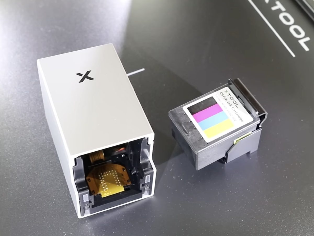CYMK printer head assembly.