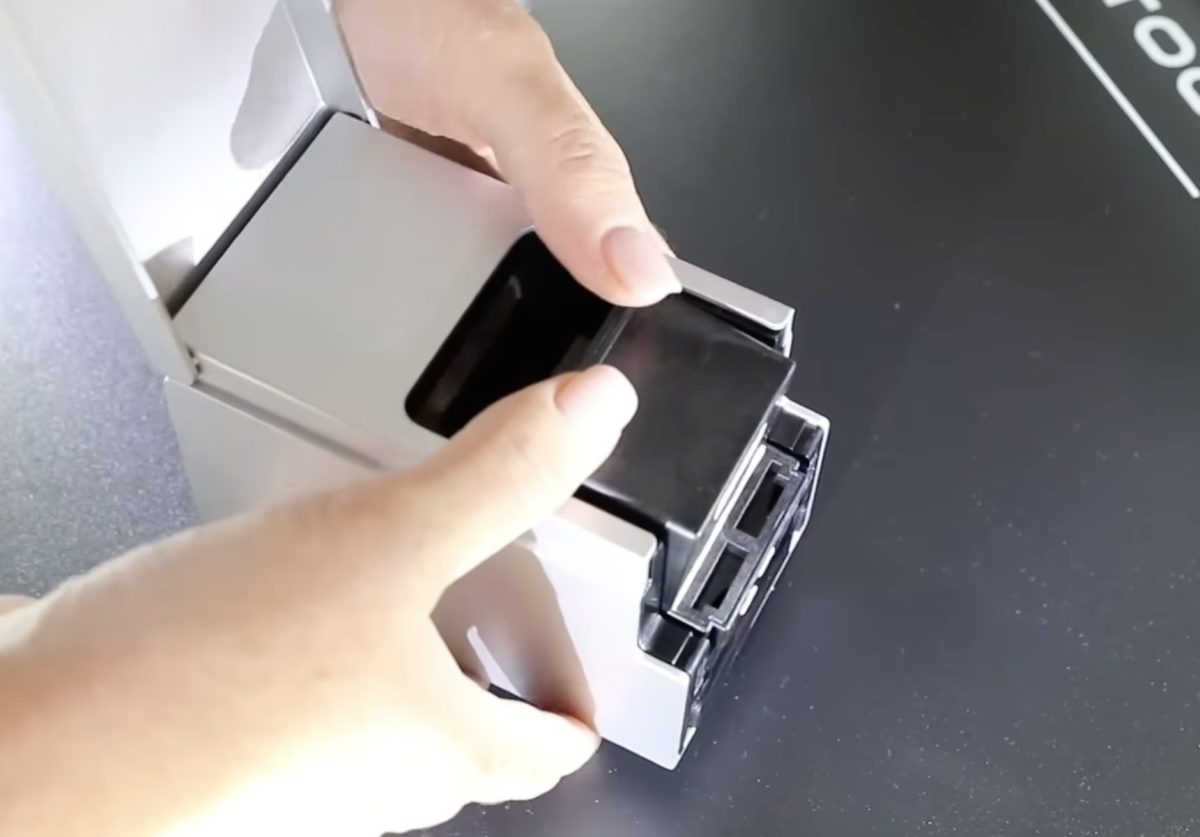 Place print head inside housing.