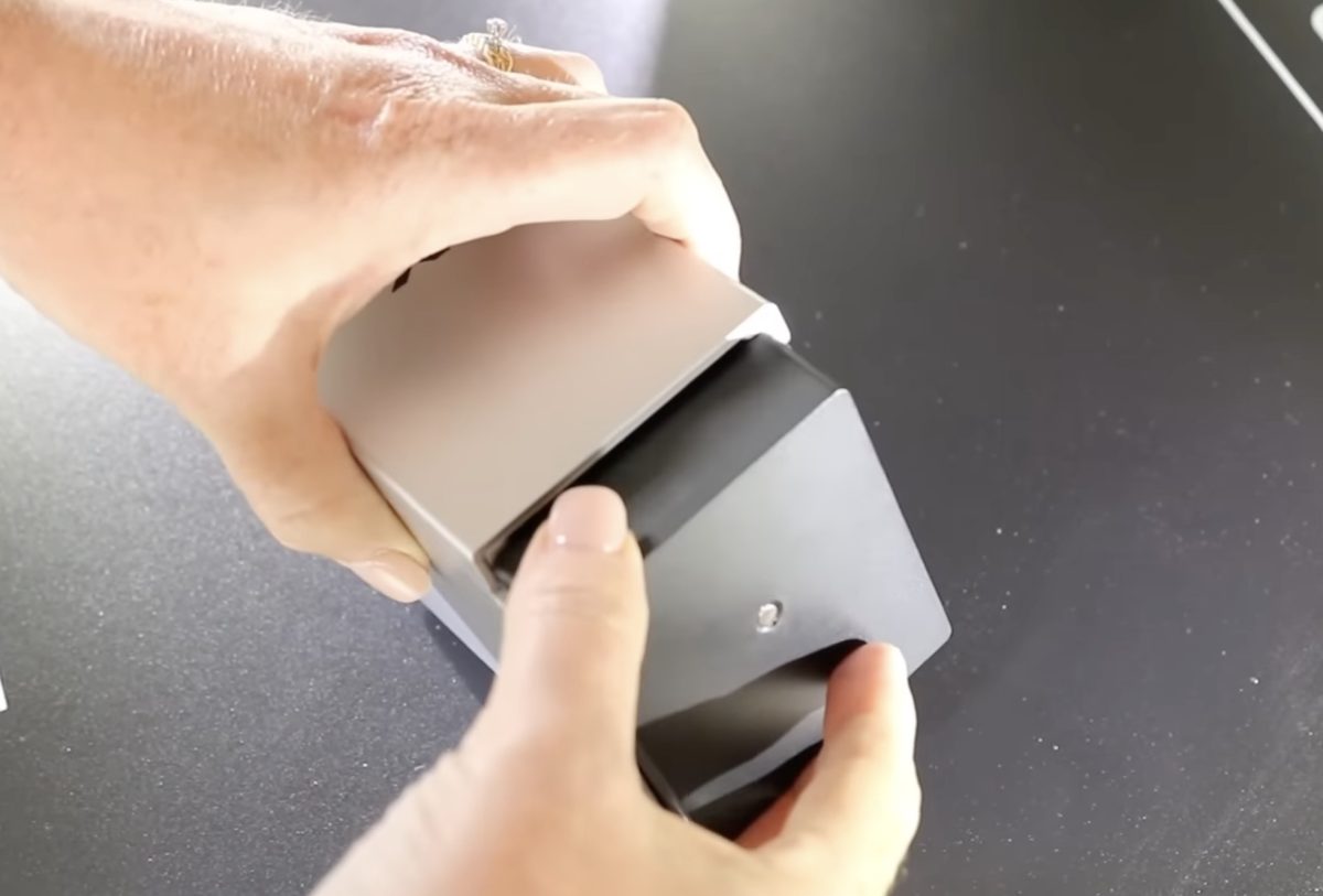 Add the cover to the printer head.