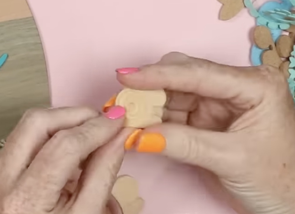 Assemble the rolled flower.