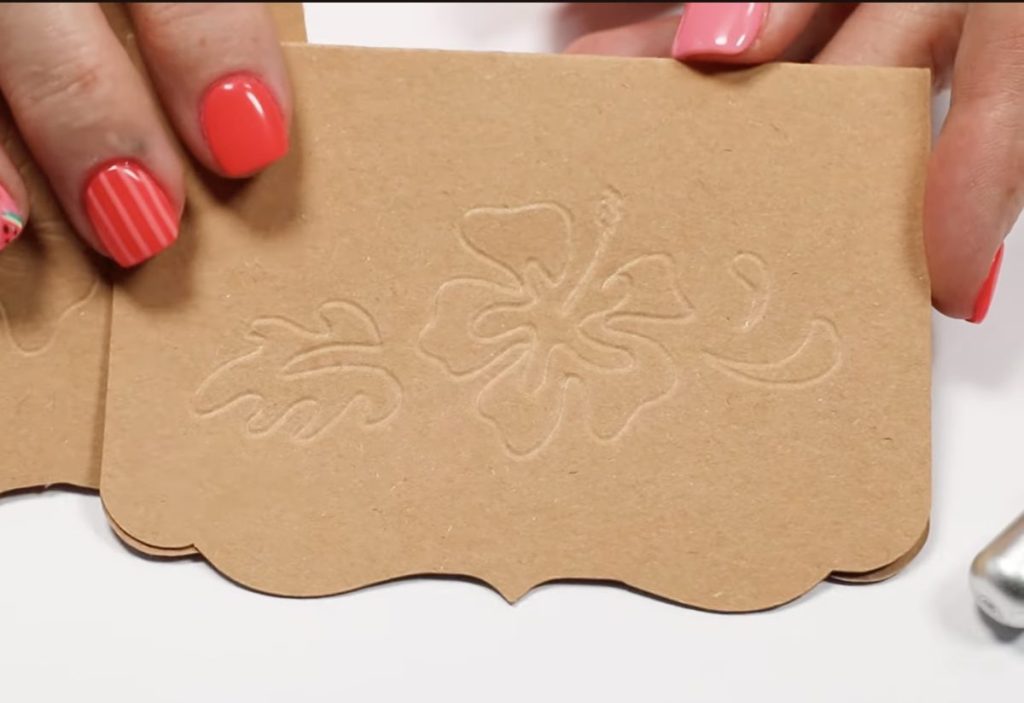 Emboss with the Cricut Deboss tool.