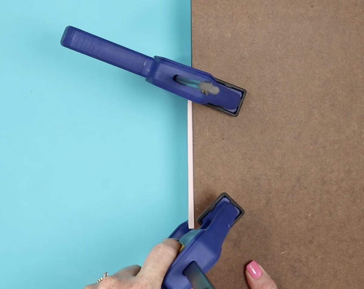 Secure the stack with clamps.