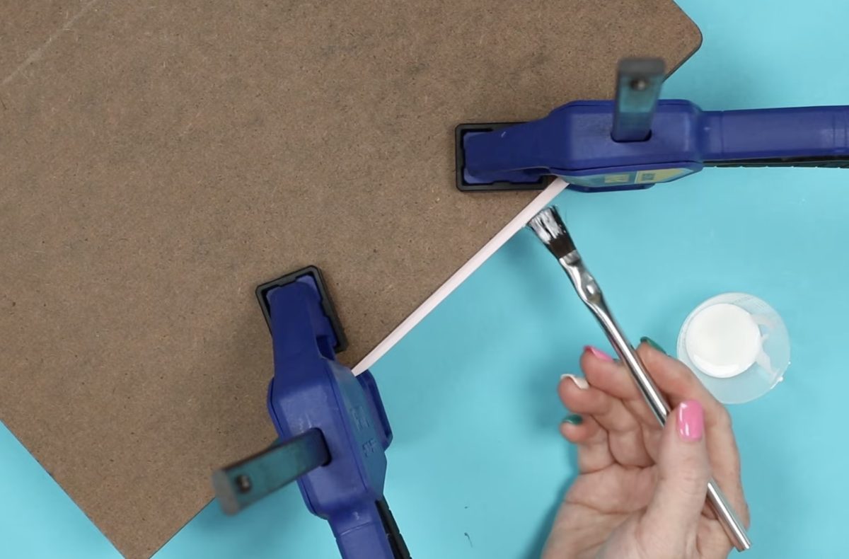 Apply padding compound to the straight side.