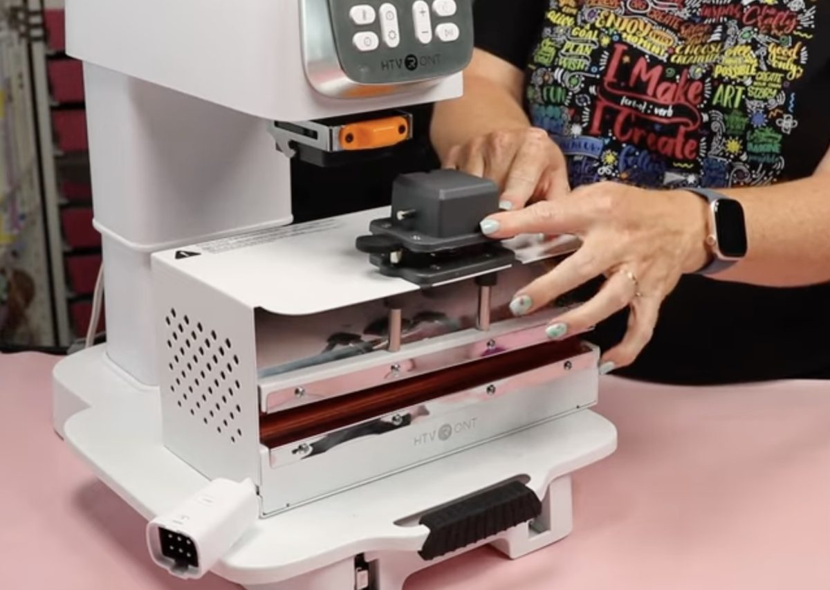 Locate tumbler press on heat press.