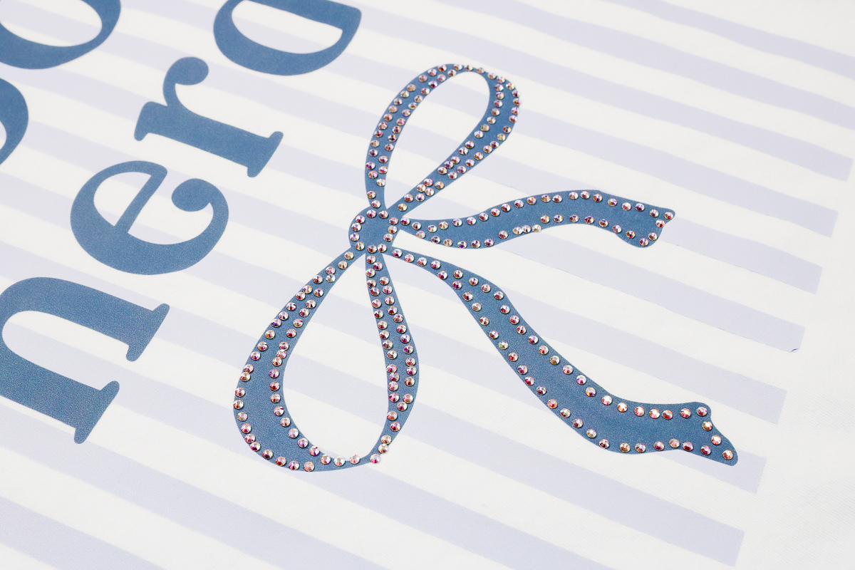 Close up of rhinestones on DTF.