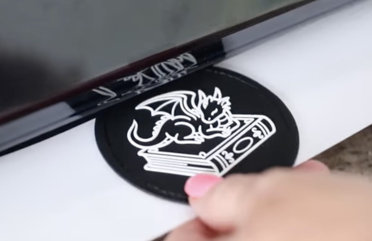Feed the leather patch through the laminator.