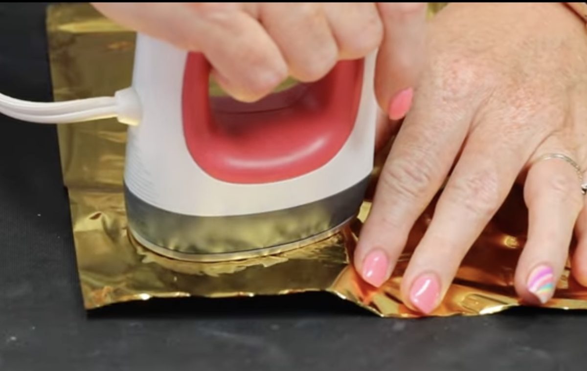 Press the foil with the EasyPress Mini.