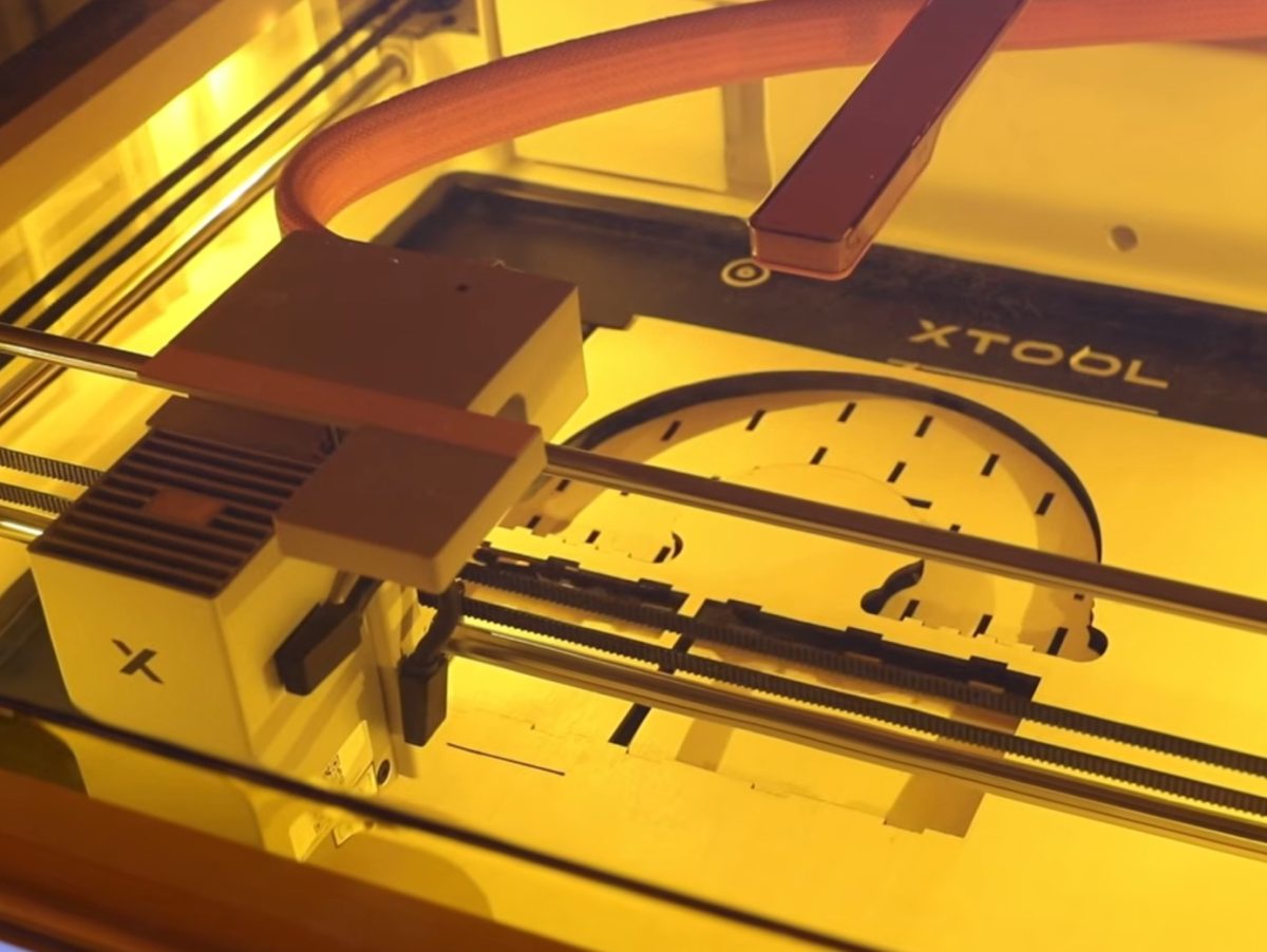 Cut wood pieces inside the laser.