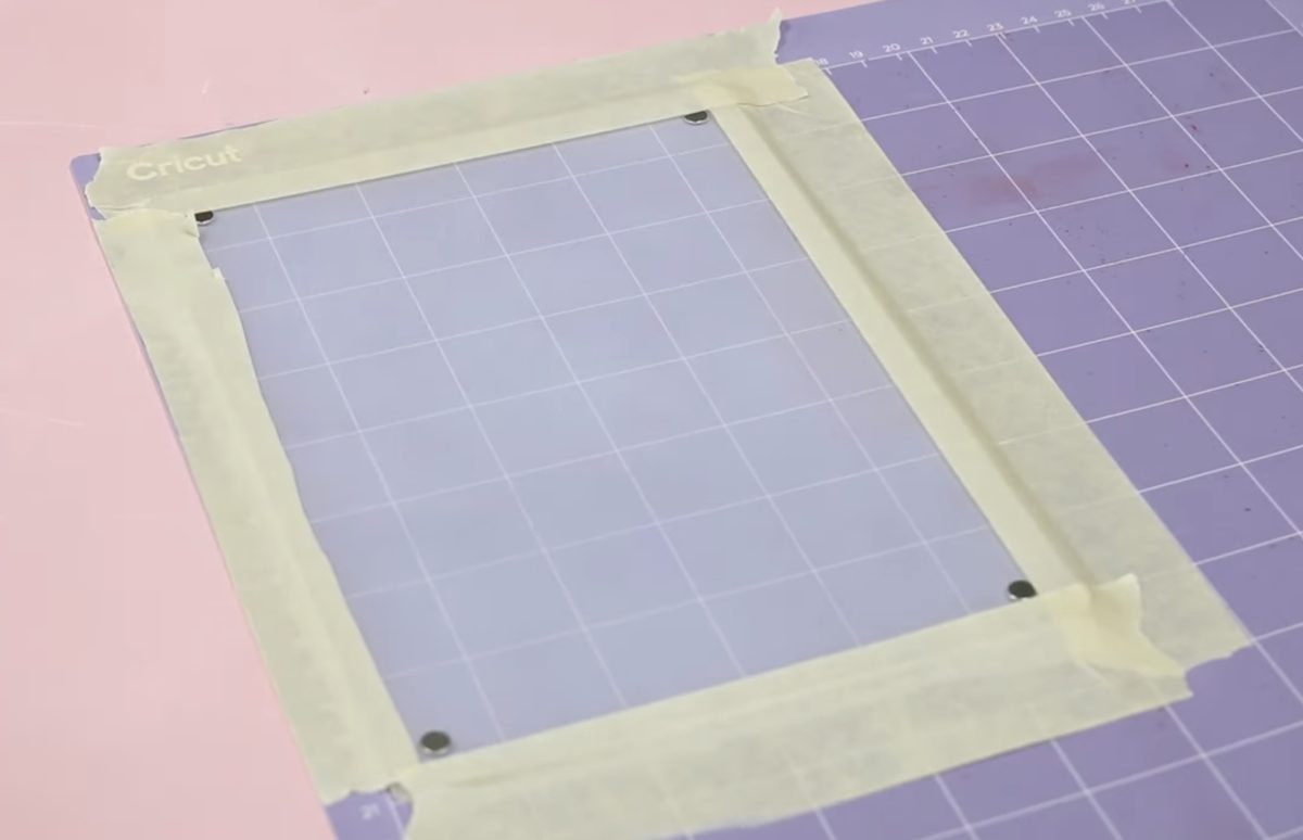 Secure acrylic on mat with tape.