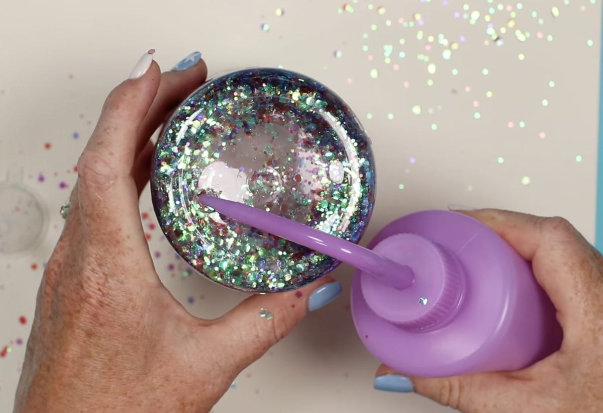 Top off the tumbler with solution.
