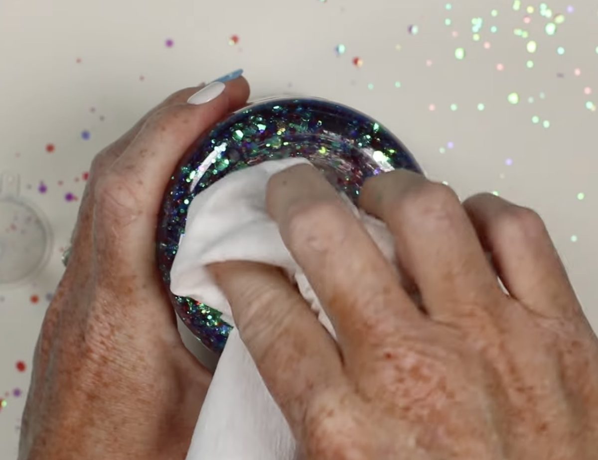 Clean and dry the surface with a lint free cloth.