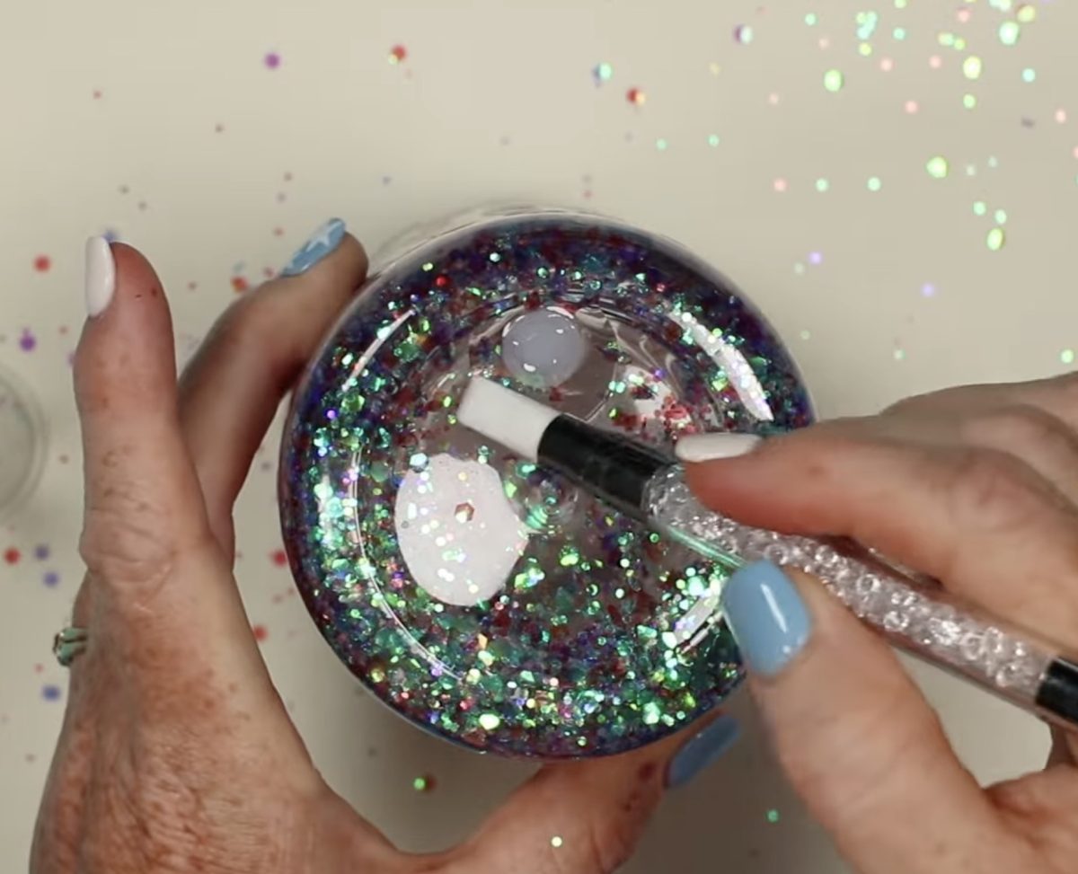 Use the silicone tool to check that the resin is cured.