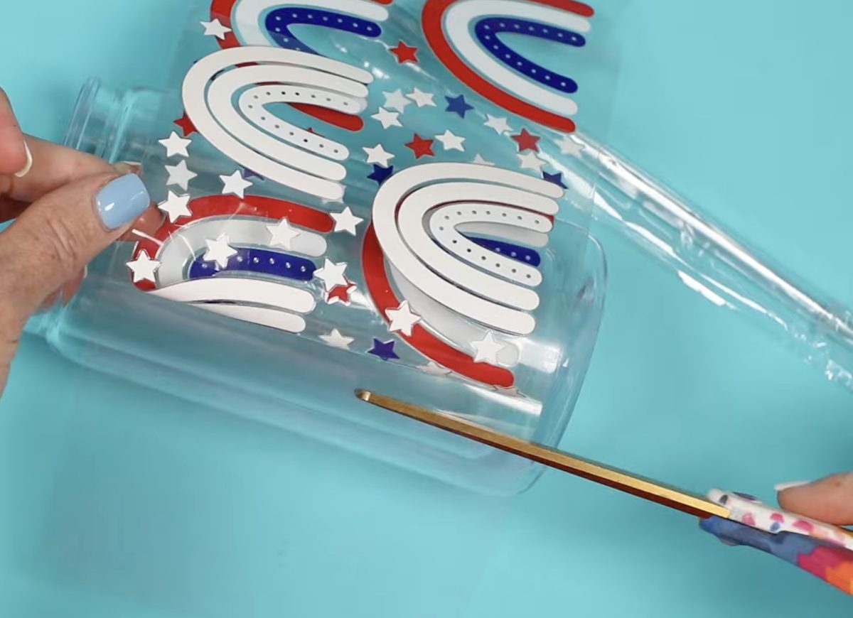 Cut away the back liner with scissors.