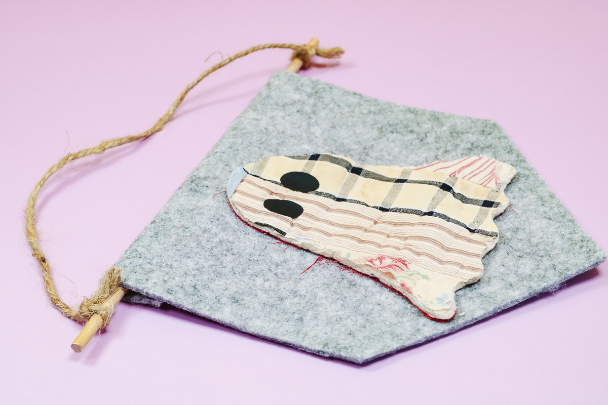 Finished quilted ghost felt flag.