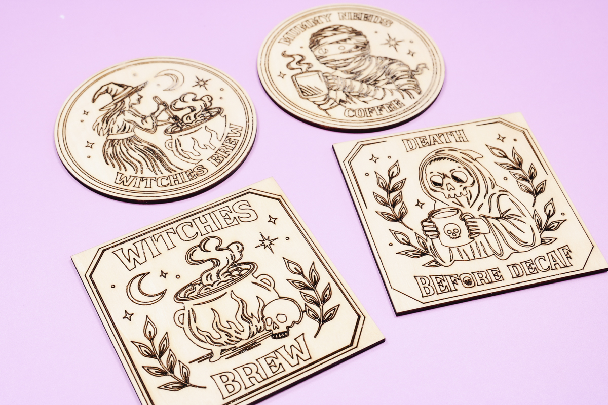 Wood cut and engraved coasters after cleaning.