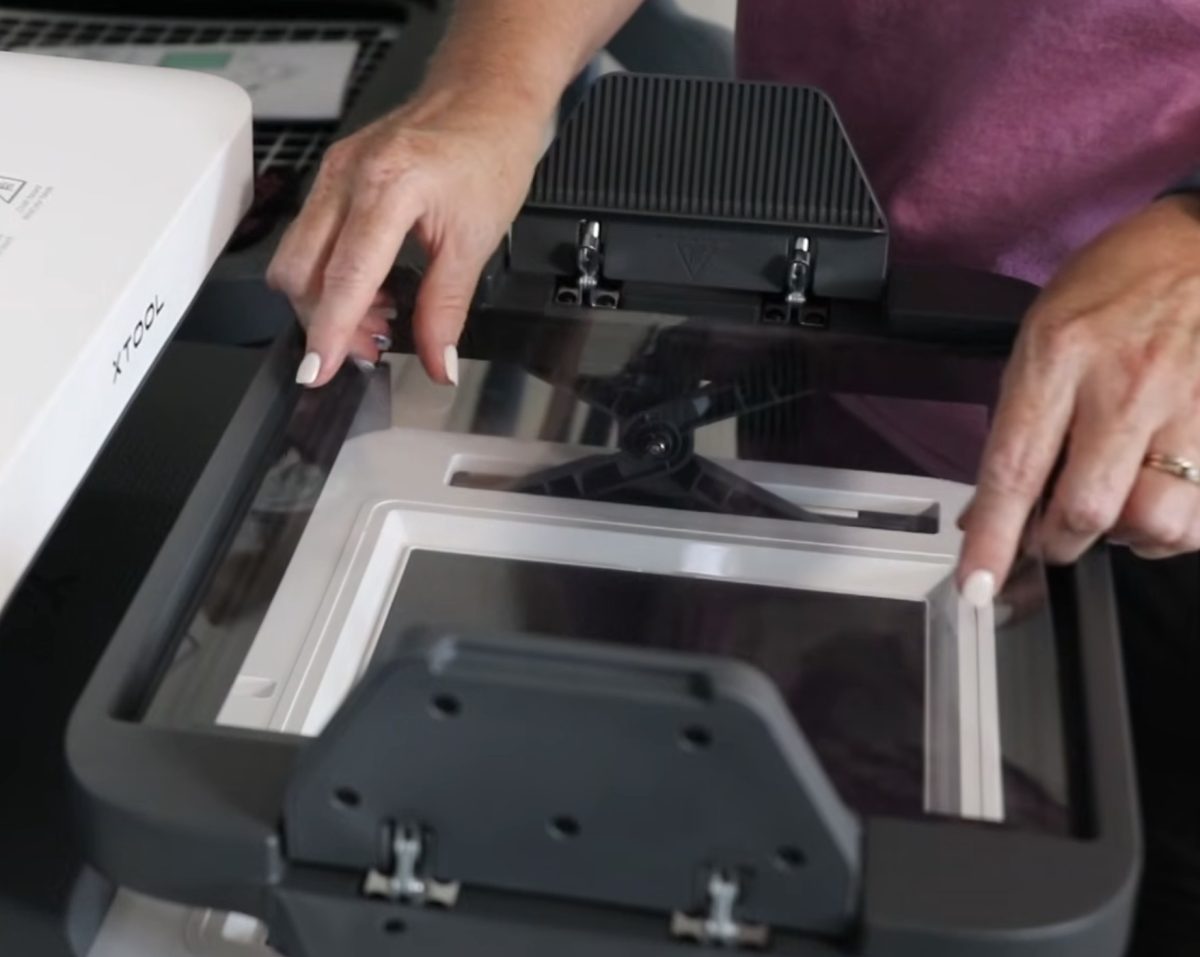 Add the film to the tray.