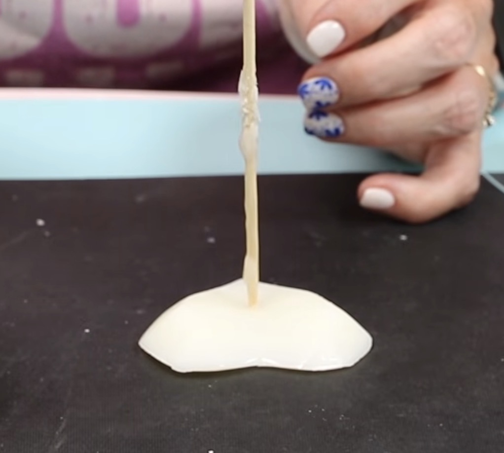 Use a wooden dowel to put a hole in the wax 3D shape.