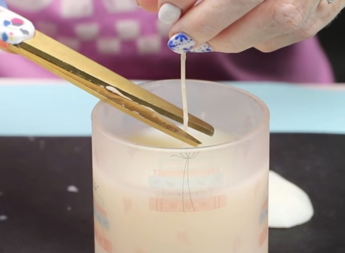 Trim the candle wick.