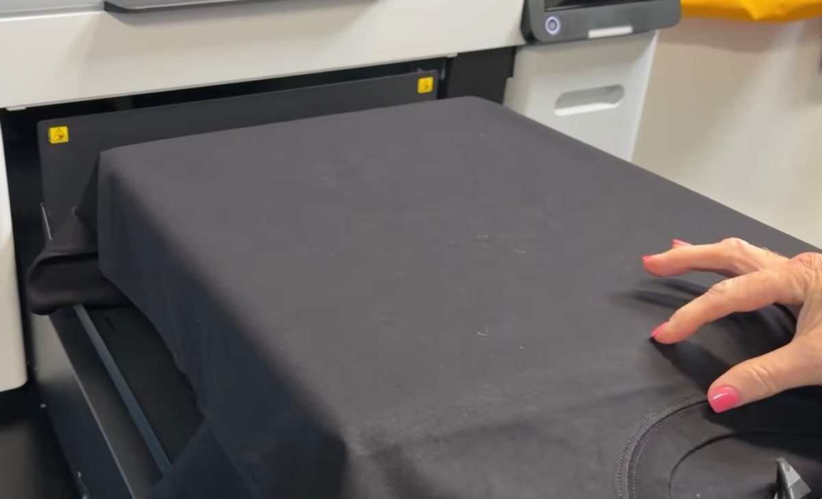 Load the shirt into the DTG printer.