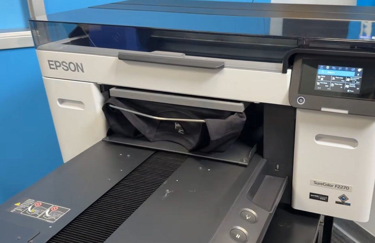 Load the shirt into the printer.