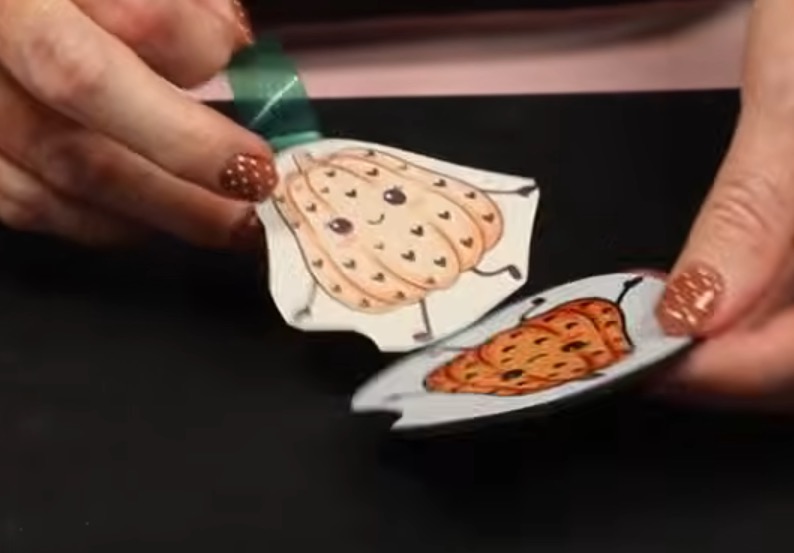 Peel back sublimation print from car coaster.