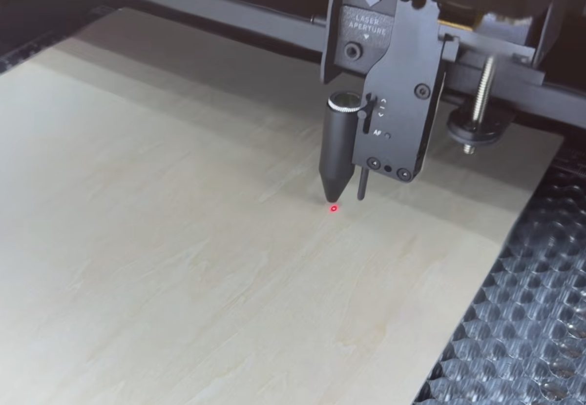 Red laser framing the cut area.