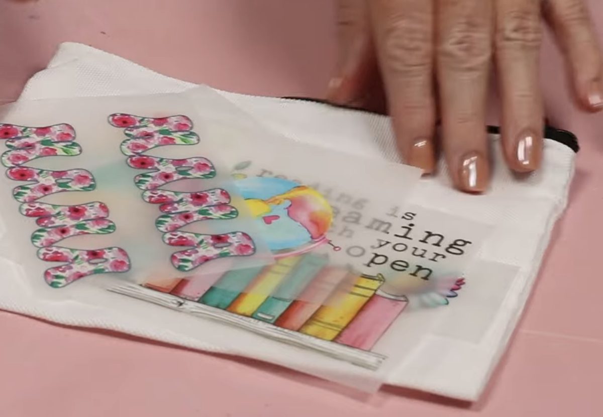 Collection of small DTF prints with a zipper pouch.