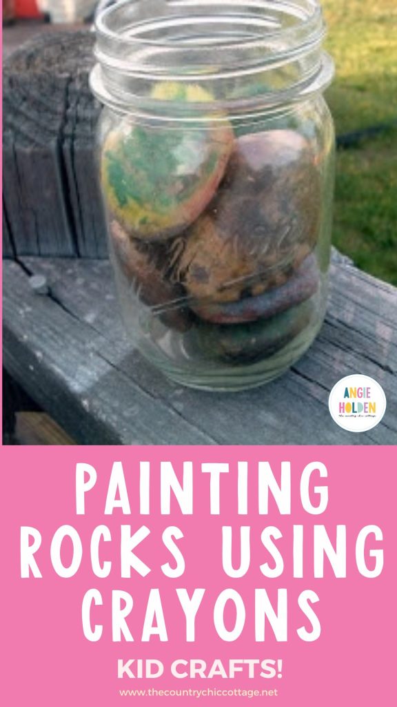 painting rocks using crayons