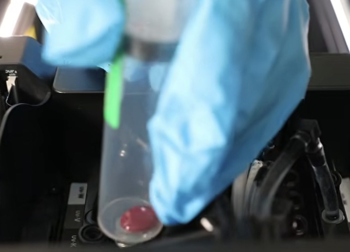 Use a syringe to pull ink through the lines.
