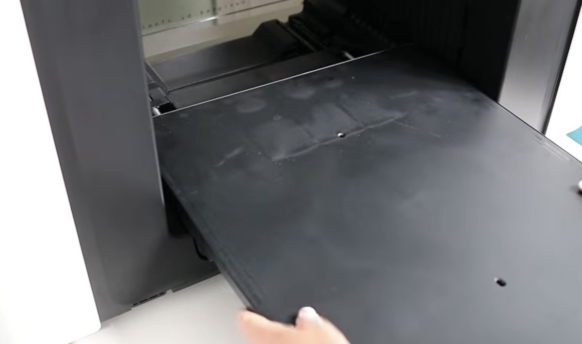 Install the large base plate.