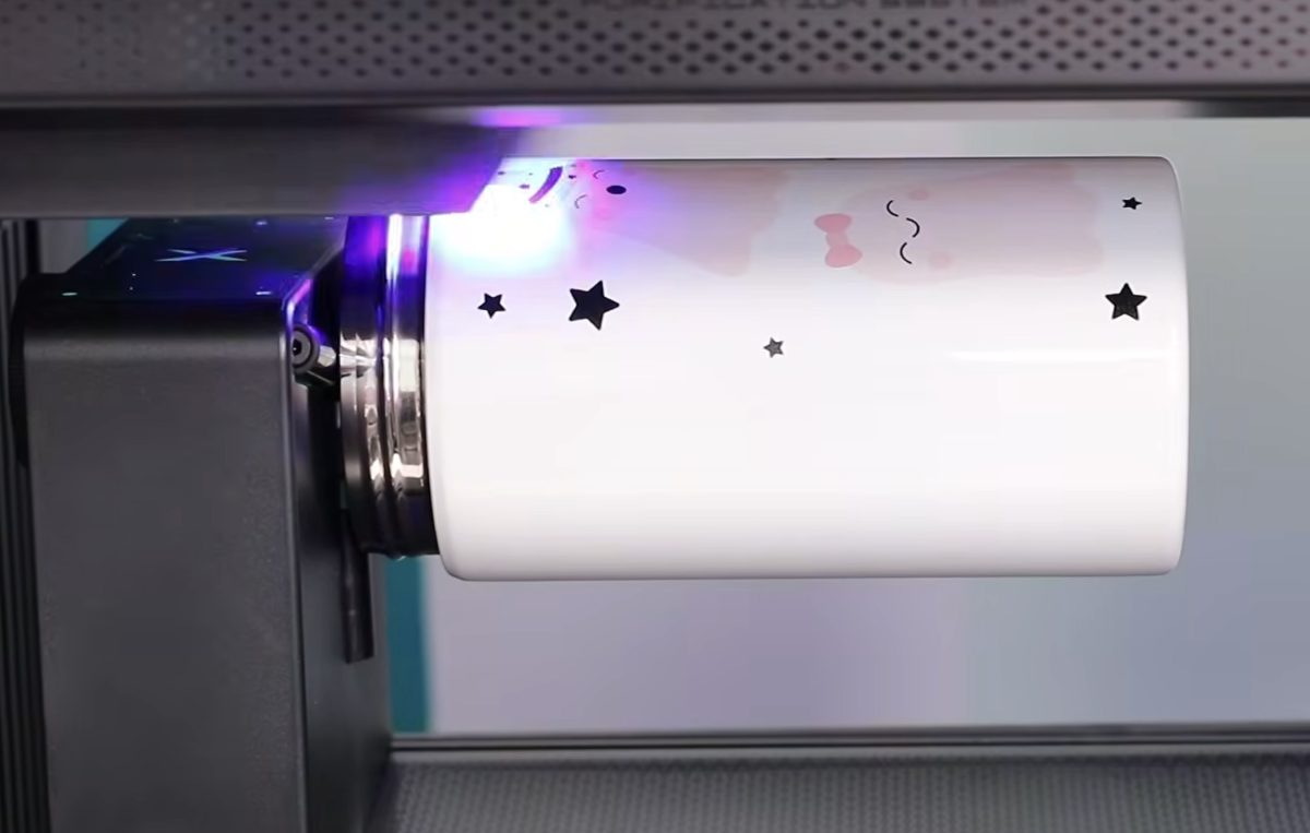xTool Omni printing on the tumbler.