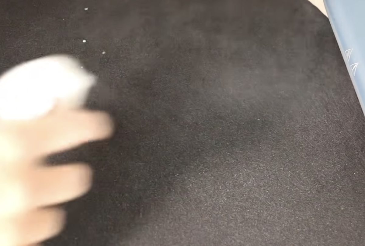 Apply pre-treatment to the shirt.